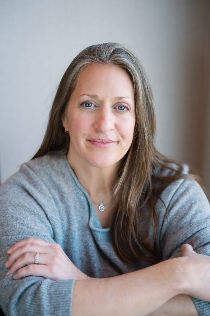 Caryn staring straight into the camera, encouraging you to do your business your way.