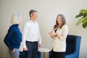 Three people standing