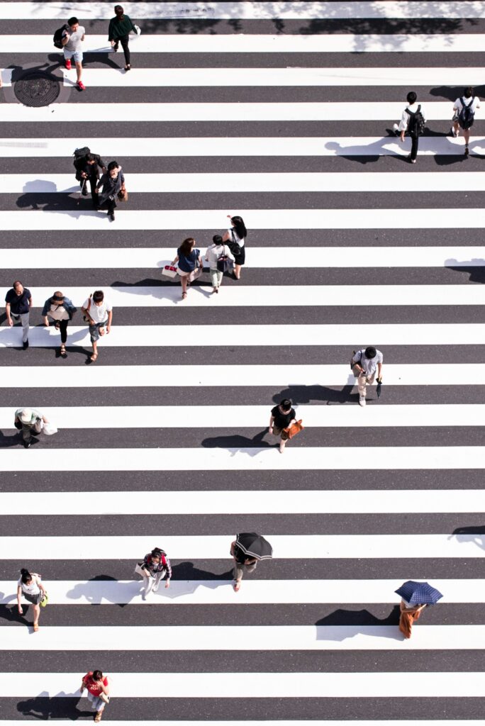 Cross walk with many people walking